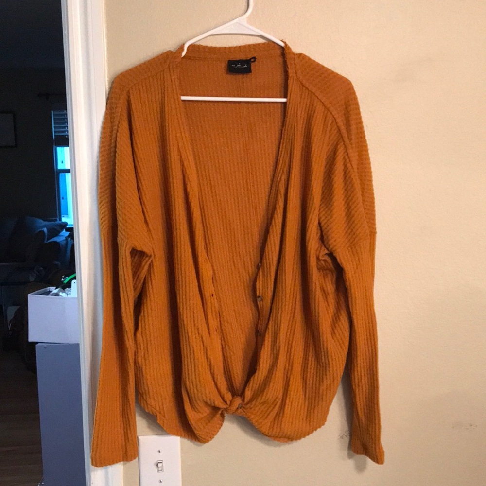 out from under cardigan in medium